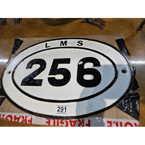 291 - an original cast iron LMS railway ridge plate no.256 with traditional white background with black pa... 