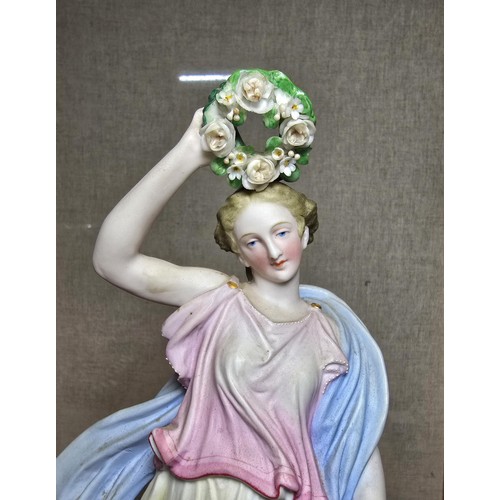 296 - A good quality antique Victorian porcelain figurine of a lady holding a Wreath standing on a wooden ... 