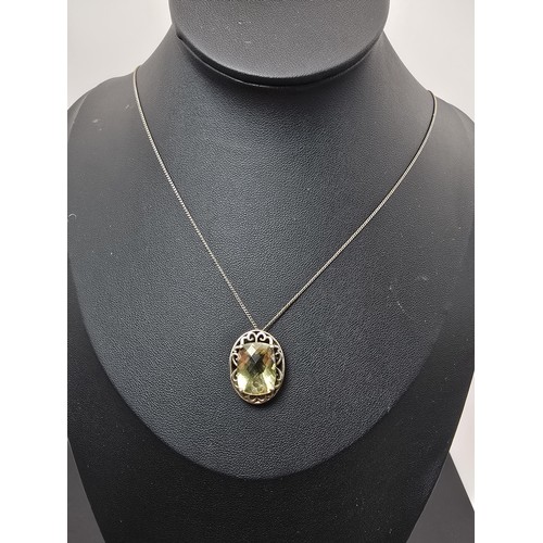 230B - A very good quality vintage 925 silver statement pendant inset with a huge 10ct natural citrine face... 