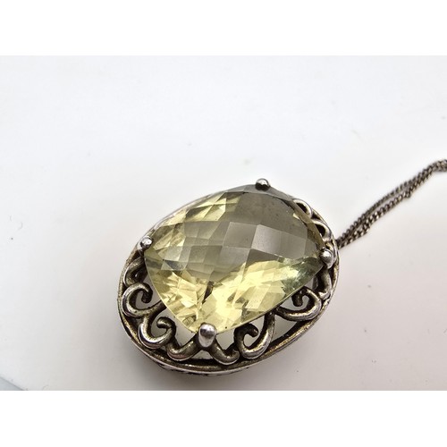 230B - A very good quality vintage 925 silver statement pendant inset with a huge 10ct natural citrine face... 