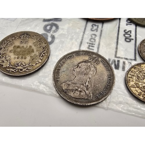 168 - A quantity of collectable coins to include 4 silver coins, to include an 1887 Queen Victoria 6 pence... 