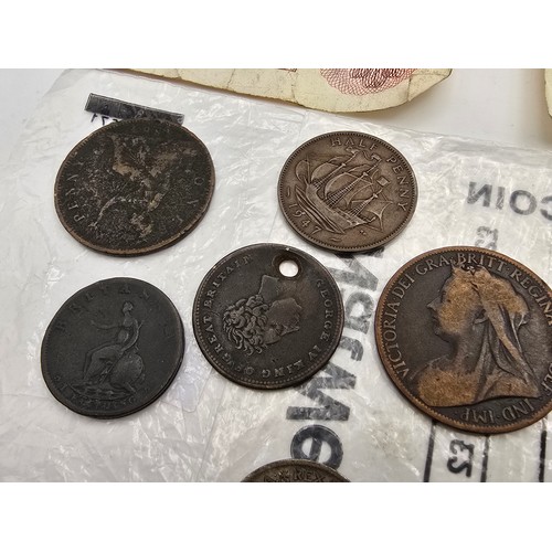 168 - A quantity of collectable coins to include 4 silver coins, to include an 1887 Queen Victoria 6 pence... 