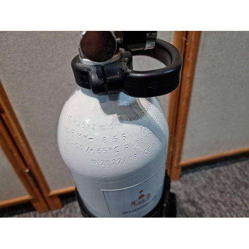 311A - Canister of CO2 gas marked Air Compressed UN 1002, complete with carrying strap and connector for ga... 