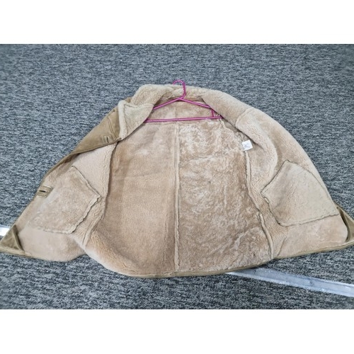 121 - 3x good quality winter coats including 2x sheepskin coats, woollen camel coat. One of the coats is m... 