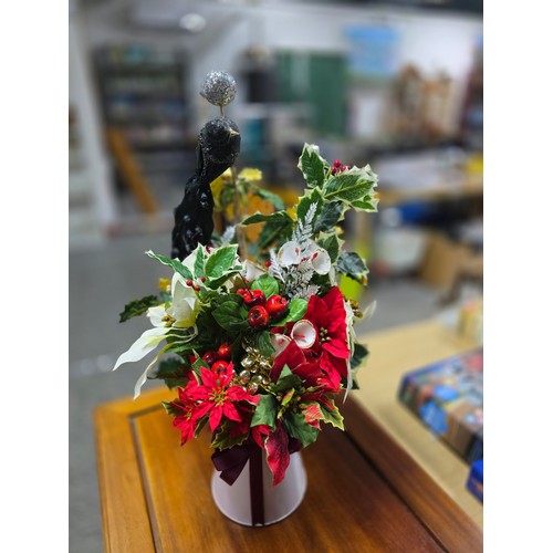 20 - Beautifully arranged spray of Christmas theme artificial flowers featuring s ball and stick with orn... 