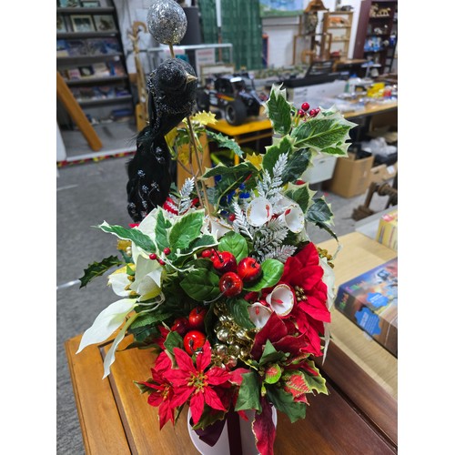 20 - Beautifully arranged spray of Christmas theme artificial flowers featuring s ball and stick with orn... 