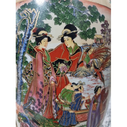 26 - A large good quality reproduction oriental vase with a hand painted image to the front with 3 dimens... 