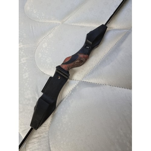 6 - A Barnett Sport flight archery bow with rubber grip, missing its string and in good condition. Lengt... 