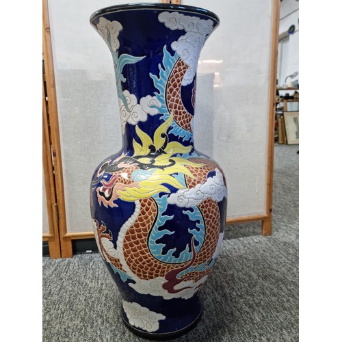 7 - A very large and impressive Chinese floor standing vase with a very colourful dragon design, in very... 