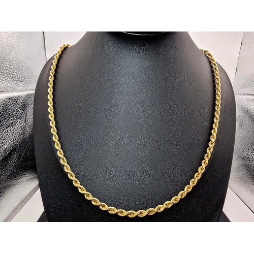 252 - A good quality chunky hallmarked 9ct yellow gold rope twist neck chain, having a total length of 20