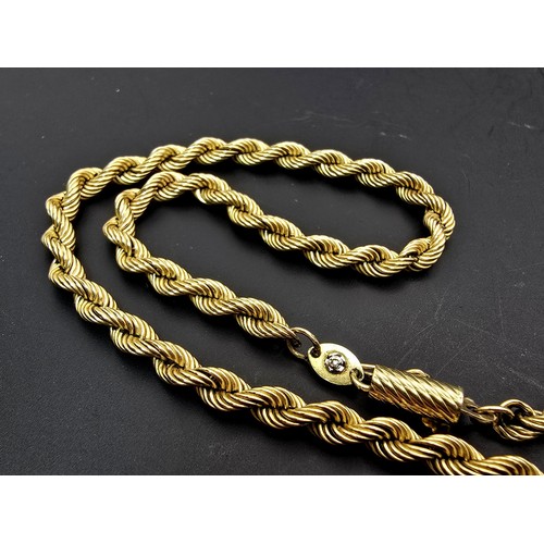 252 - A good quality chunky hallmarked 9ct yellow gold rope twist neck chain, having a total length of 20