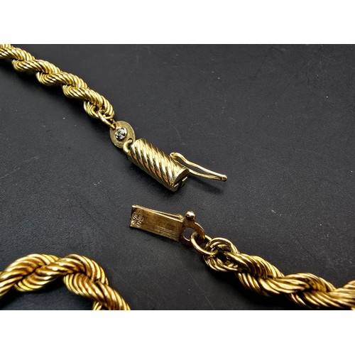 252 - A good quality chunky hallmarked 9ct yellow gold rope twist neck chain, having a total length of 20