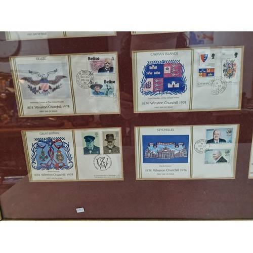 28 - Large framed and glazed set of First Edition First Day covers of the Winston Churchill stamp set con... 