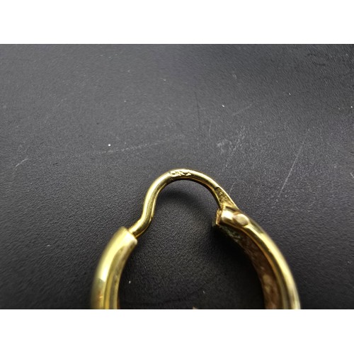 264 - A pair of small 18ct yellow gold hoop earrings with a chunky design, the earrings are in good condit... 