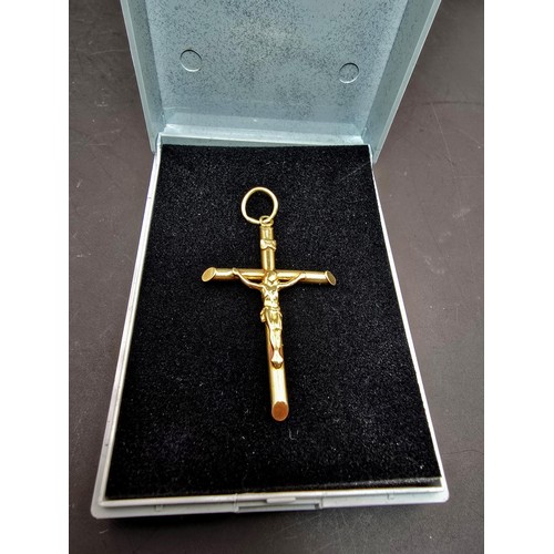 266 - A good 9ct yellow gold large crucifix pendant which is well cast, presenting good detail, length of ... 