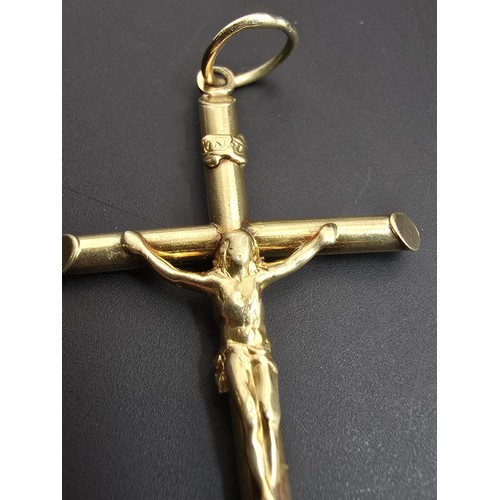 266 - A good 9ct yellow gold large crucifix pendant which is well cast, presenting good detail, length of ... 