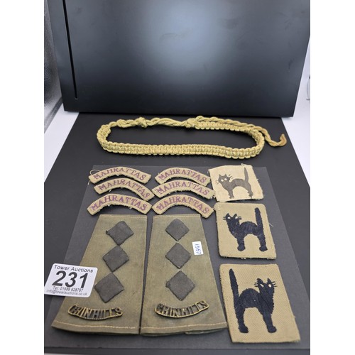 231 - A collection of very rare antique British Indian Army related items to include a rare pair of rank s... 