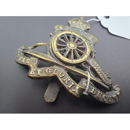 233 - A collection of early vintage military items to include a rare WWII 22nd field regiment Royal Artill... 