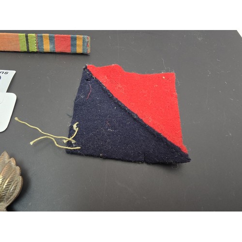 233 - A collection of early vintage military items to include a rare WWII 22nd field regiment Royal Artill... 