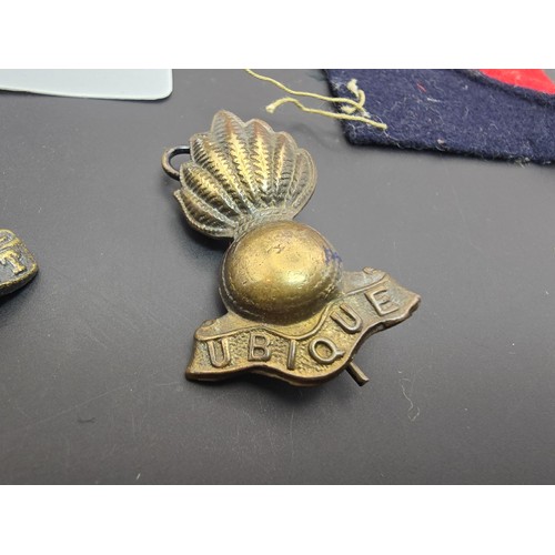 233 - A collection of early vintage military items to include a rare WWII 22nd field regiment Royal Artill... 