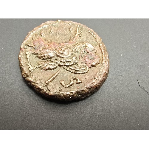 236 - An interesting ancient coin which appears to be an Egyptian AD 270-275 coin depicting Alexandria Aur... 