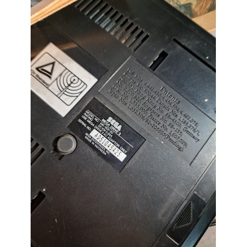 57 - 2x  Sega Mega Drive II consoles, 1 complete with cables and controller, the other without, also incl... 