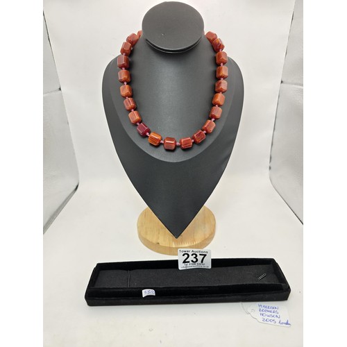 237 - A stunning vintage Bakelite beaded hand knotted necklace featuring shaped cubed beads, the Bakelite ... 