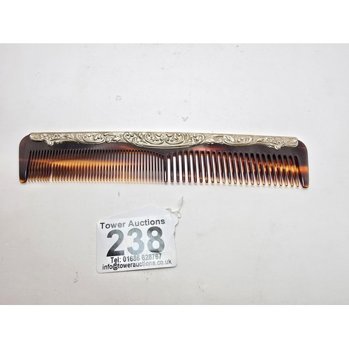 238 - An attractive hallmarked silver comb hallmarked to Birmingham 1992 by Broadway, the comb is in good ... 