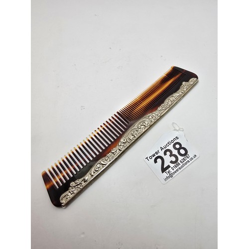 238 - An attractive hallmarked silver comb hallmarked to Birmingham 1992 by Broadway, the comb is in good ... 