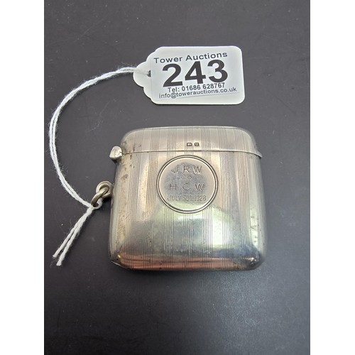 243 - A good quality heavy hallmarked silver Vesta case having an engraved striped design, featuring a str... 