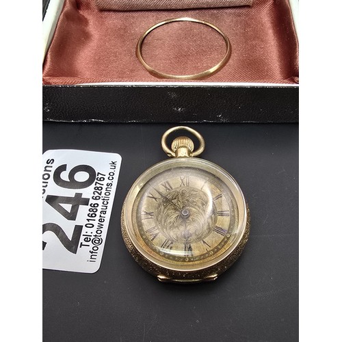 246 - A good quality antique 14ct yellow gold fob watch featuring an ornate engraved case, having a blank ... 