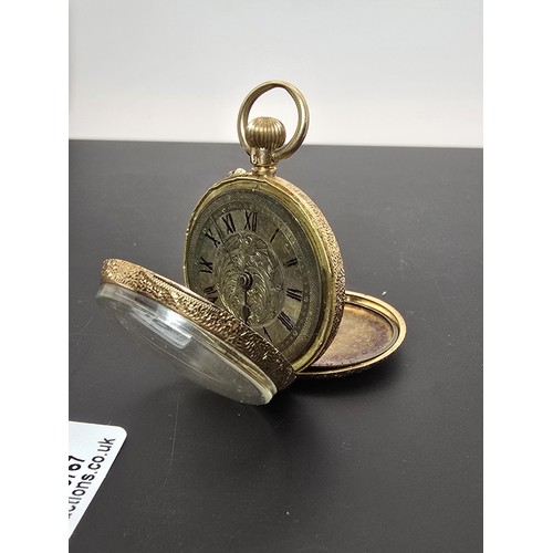 246 - A good quality antique 14ct yellow gold fob watch featuring an ornate engraved case, having a blank ... 