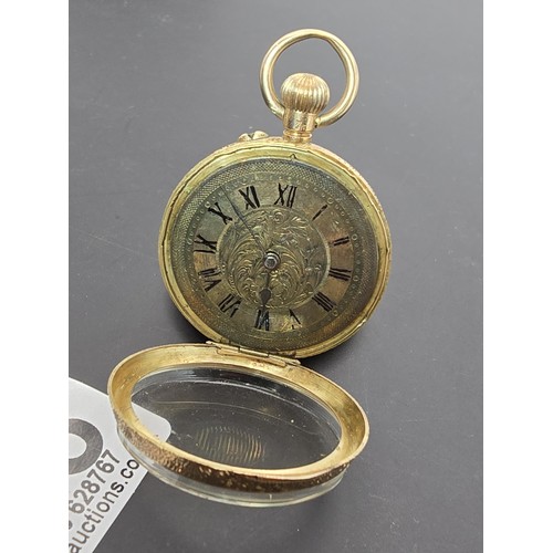 246 - A good quality antique 14ct yellow gold fob watch featuring an ornate engraved case, having a blank ... 