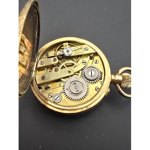 246 - A good quality antique 14ct yellow gold fob watch featuring an ornate engraved case, having a blank ... 