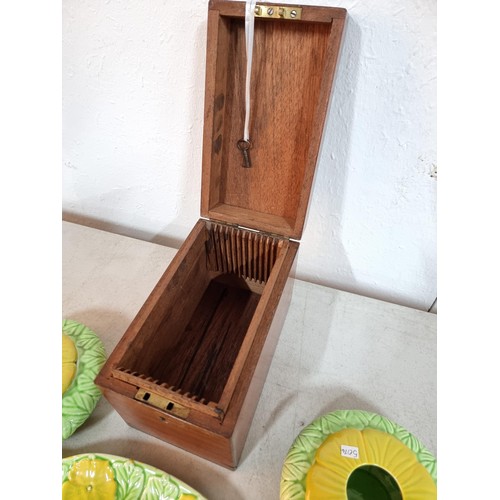 134 - A good quality mahogany storage box for magic lantern slides complete with key in good order along w... 