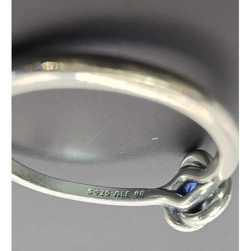 179 - An as new genuine Pandora 925 silver ring inset with a blue crystal stone, the ring is marked S925 A... 