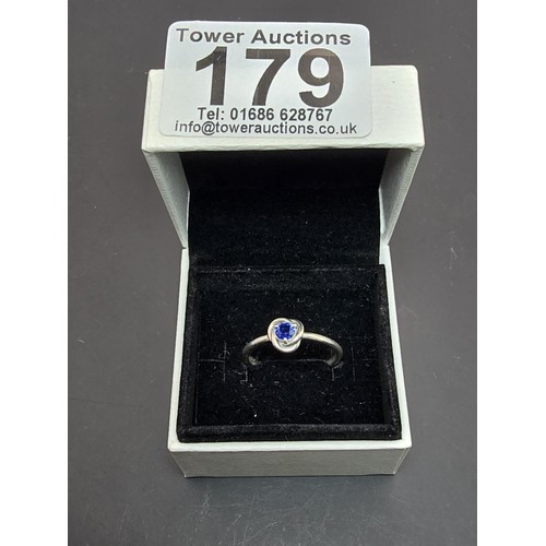 179 - An as new genuine Pandora 925 silver ring inset with a blue crystal stone, the ring is marked S925 A... 