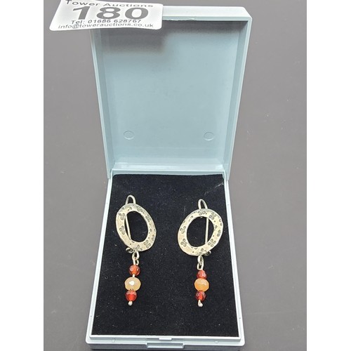 180 - A pair of vintage 925 silver drop earrings featuring garnet and carnelian beaded drops. The earrings... 