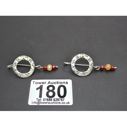 180 - A pair of vintage 925 silver drop earrings featuring garnet and carnelian beaded drops. The earrings... 