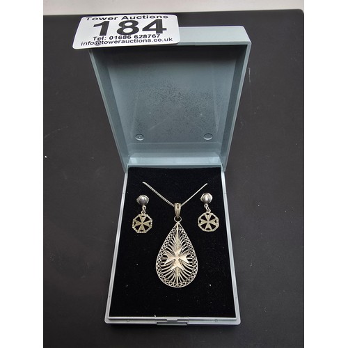 184 - A pretty 925 silver matching jewellery set featuring a Maltese cross pendant with a filigree design ... 