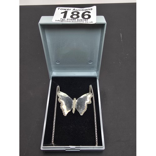 186 - A pretty 925 silver necklace featuring a large butterfly pendant, in good clean condition having a t... 