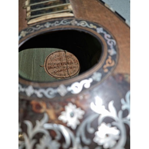 297 - Vintage mandolin by Pietro Ruffini made in Italy with tortoise shell front, missing its strings and ... 