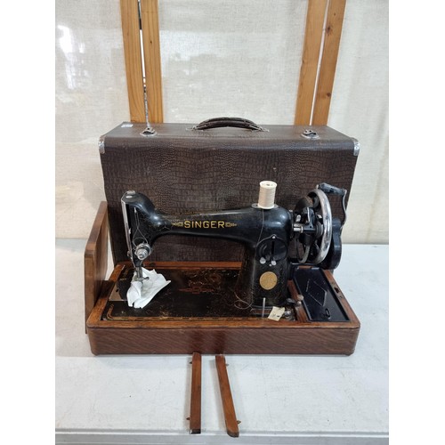 304 - Antique hard cased manual Singer sewing machine model E8922038, complete with instruction manual and... 