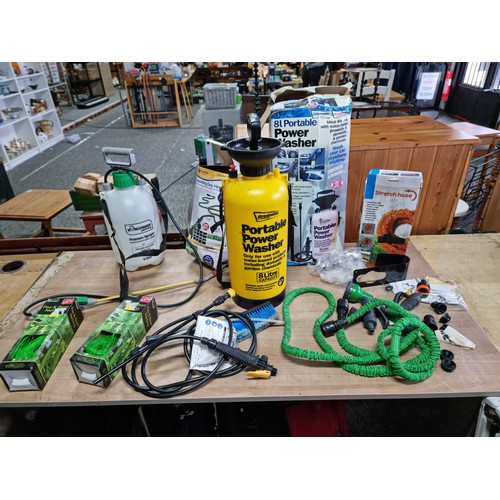 311 - Quantity of hose and sprayers inc an 8 litre portable manual power washer, 2x boxed stretch hoses in... 