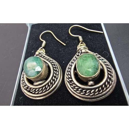 190 - Pair of unusual middle eastern Silver plated drop earrings inset with large faceted genuine green sa... 