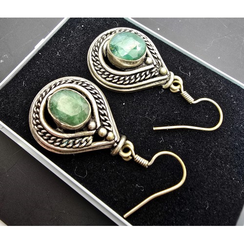 190 - Pair of unusual middle eastern Silver plated drop earrings inset with large faceted genuine green sa... 