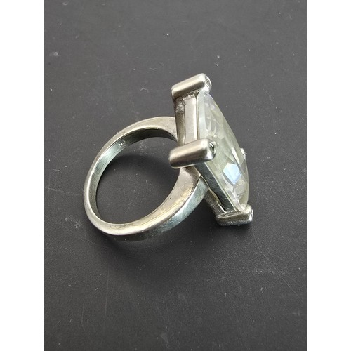 192 - Impressive Hallmarked 925 Silver dress ring inset with a large faceted crystal glass stone in clean ... 