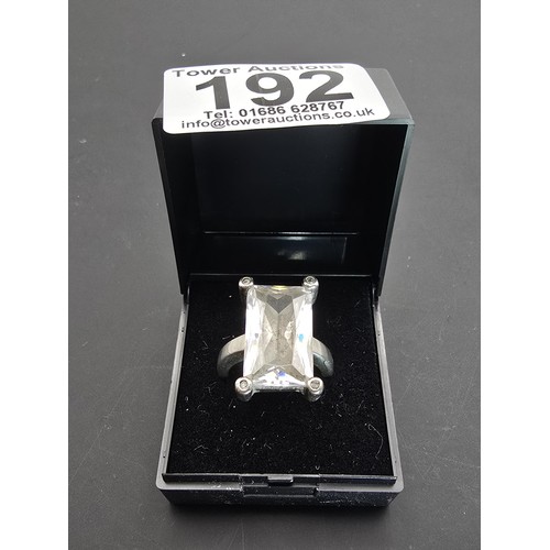 192 - Impressive Hallmarked 925 Silver dress ring inset with a large faceted crystal glass stone in clean ... 