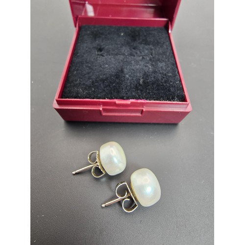 197 - Pair of pretty cultured pearl 925 Silver stud earrings in as new condition, the pearls have a vibran... 