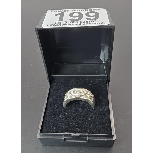 199 - Unusual 925 Silver ring inset with  a quantity of triangular cut CZ Stones in clean condition and bo... 